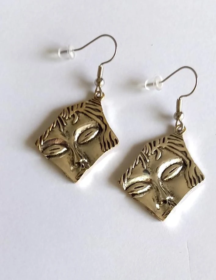 Boucles oreilles argentées visage femme crochets argent neuves création